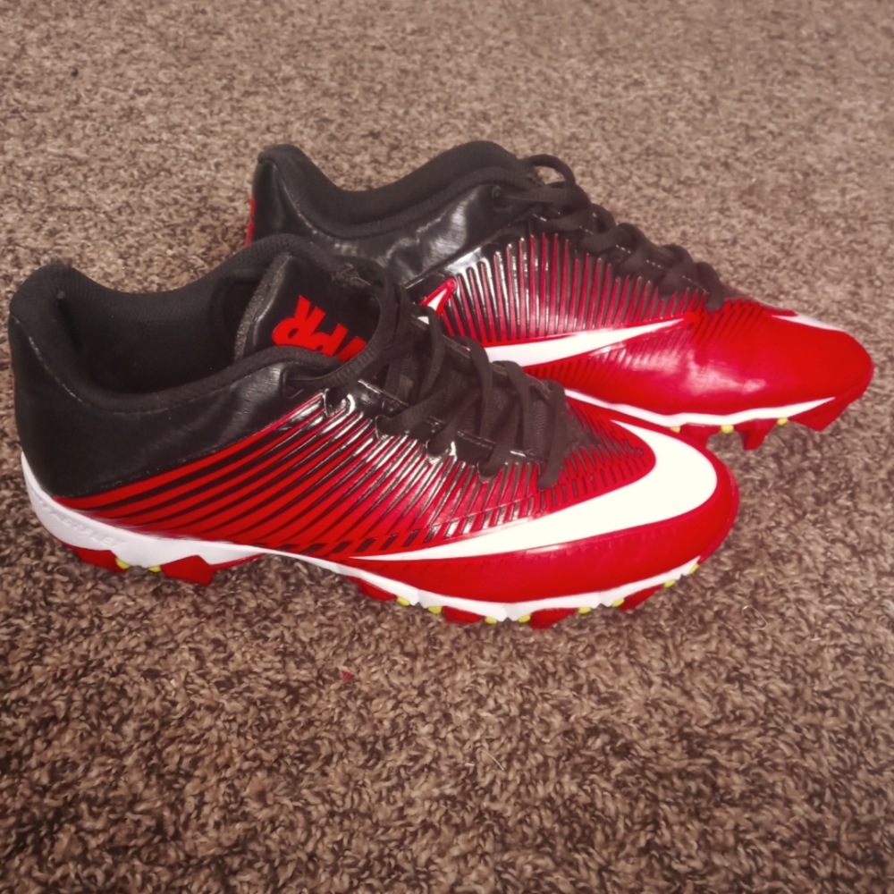 Black, white, and red Nike cleats